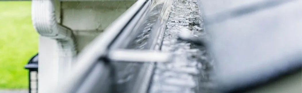 Best Gutters for Heavy Rain in Texas - Image of Rain in Gutters